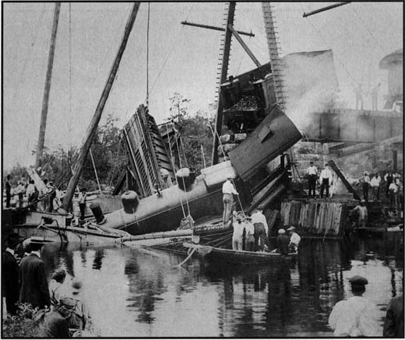 Delaware Railroad's Norfolk Express collides with a the schooner "Golden Gate" on June 20, 1904, in Laurel, Delaware, at open railroad drawbridge, photo courtesy of Mariners Museum, Newport News, VA.